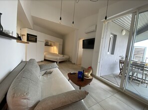 TV - Le Couchant studio Vue Mer B401 dans résidence avec accès privé à la plage (Le Grau-du-Roi)