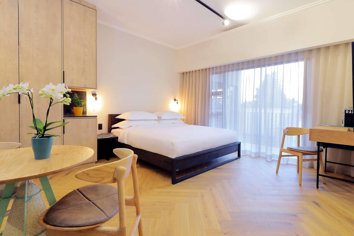 In-room safe, desk, laptop workspace, blackout curtains
