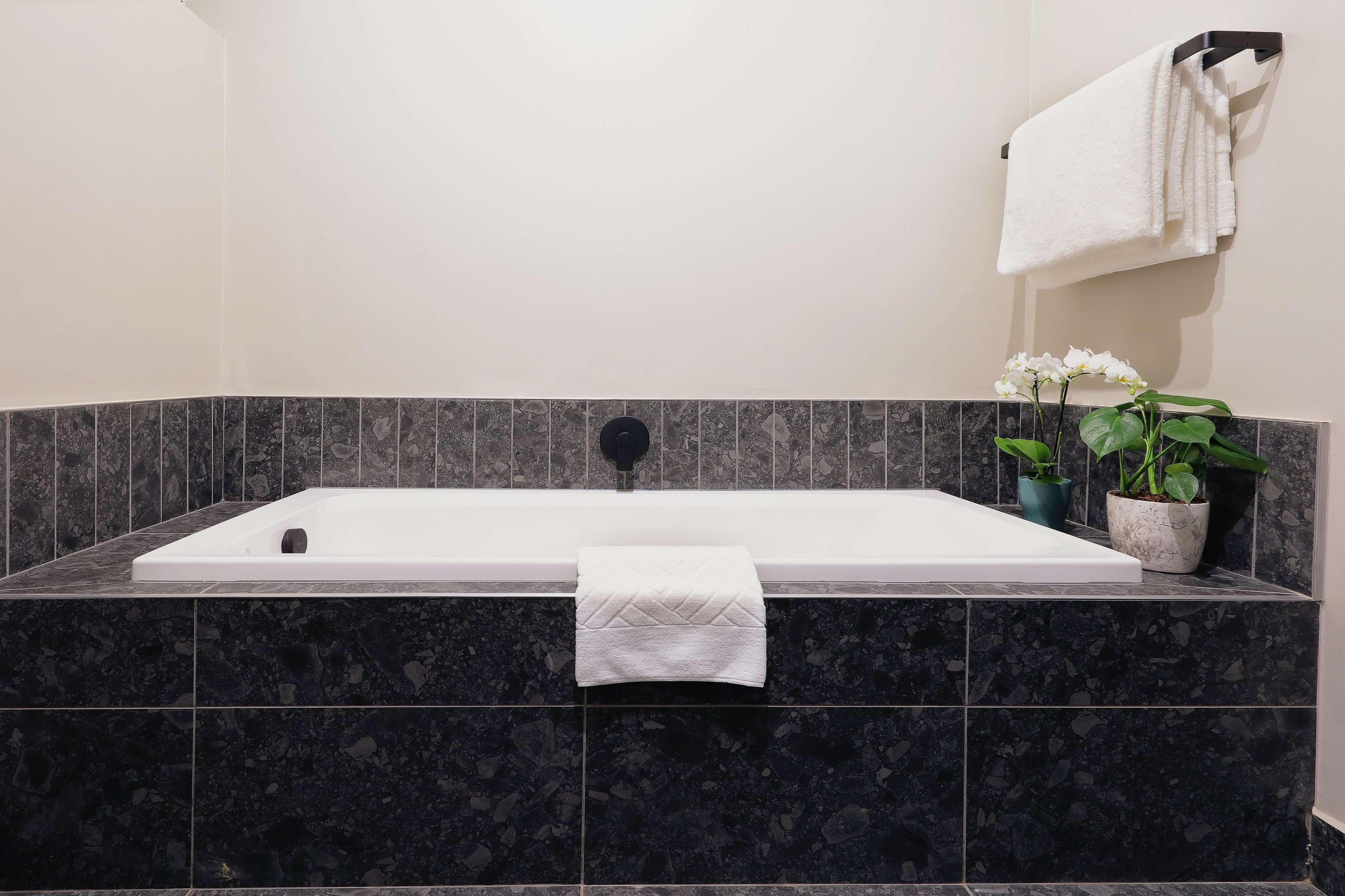 family suite | bathroom | hair dryer, towels