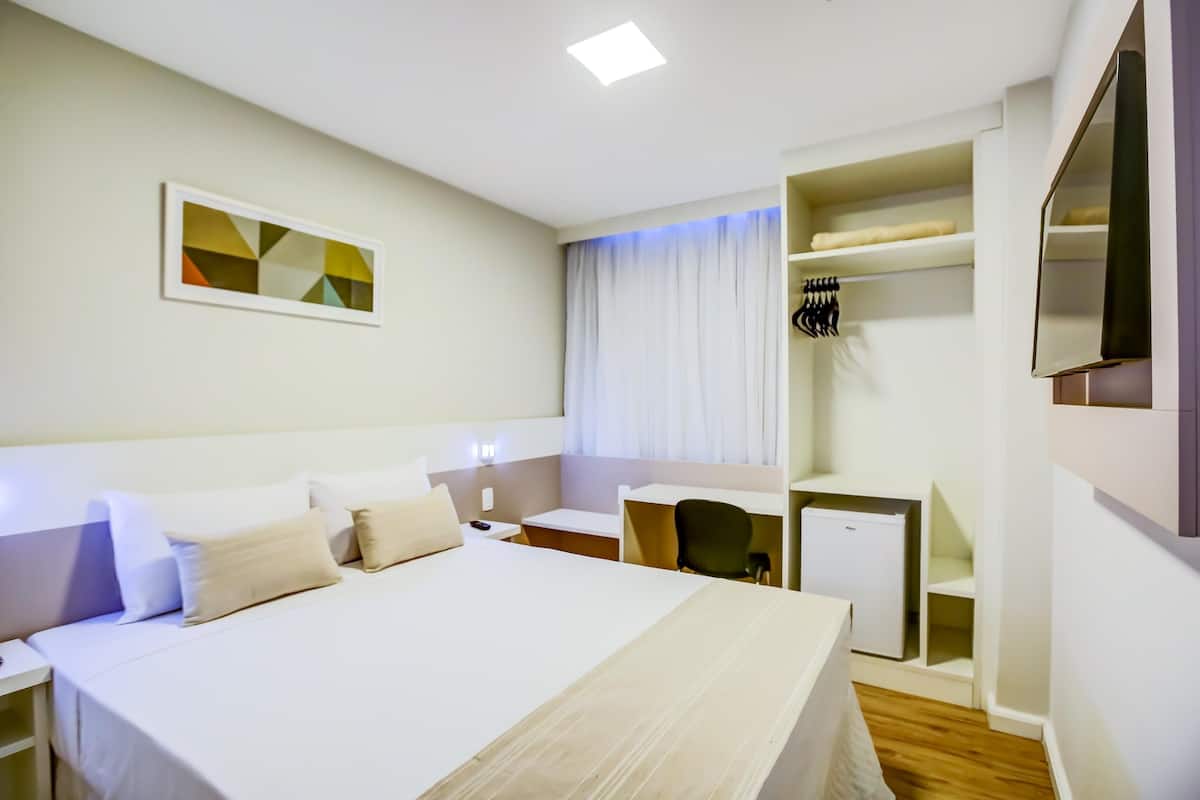 Minibar, desk, laptop workspace, iron/ironing board