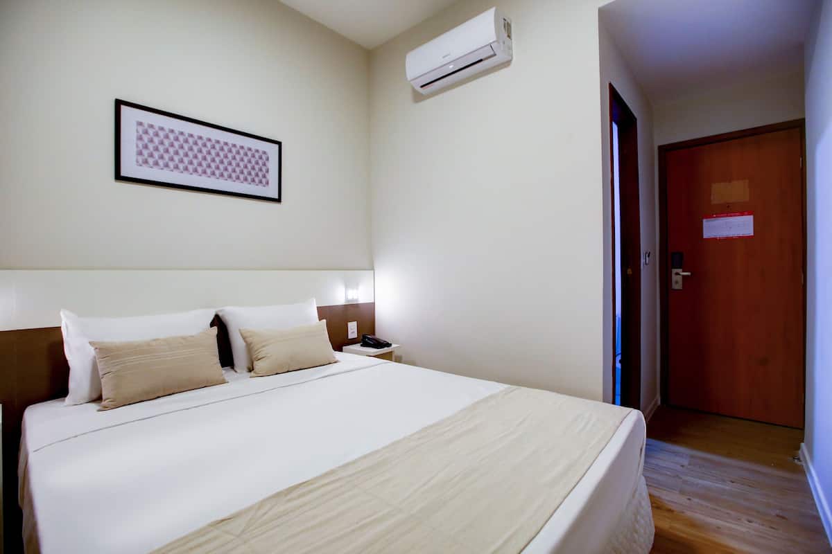 Standard Double Room | Minibar, desk, laptop workspace, iron/ironing board