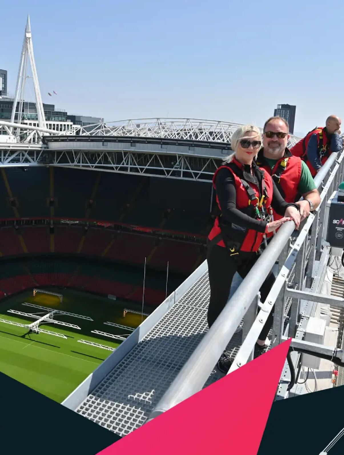 A stadium with a large, open field and a high observation deck.