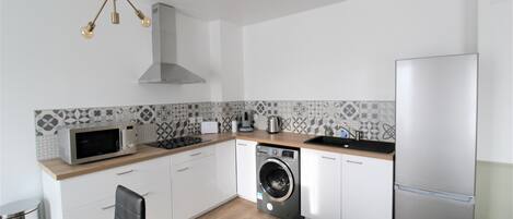 Microwave, coffee/tea maker, cookware/dishes/utensils