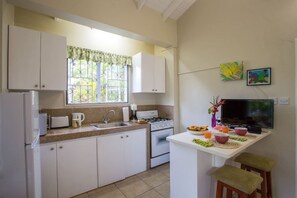 Microwave, coffee/tea maker, cookware/dishes/utensils