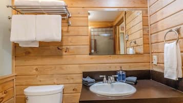 Bathtub, eco-friendly toiletries, hair dryer, towels