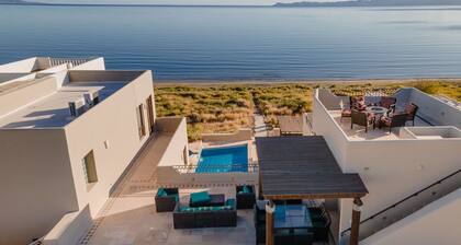 Large Luxury Beachfront Villa with Pool, Paddleboards, Golf Carts- Family Ready!