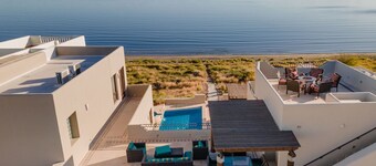 Large Luxury Beachfront Villa with Pool, Paddleboards, Golf Carts- Family Ready!