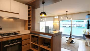 Departamento Confort | Cocina privada | Refrigerador, microondas, parrilla de estufa y licuadora