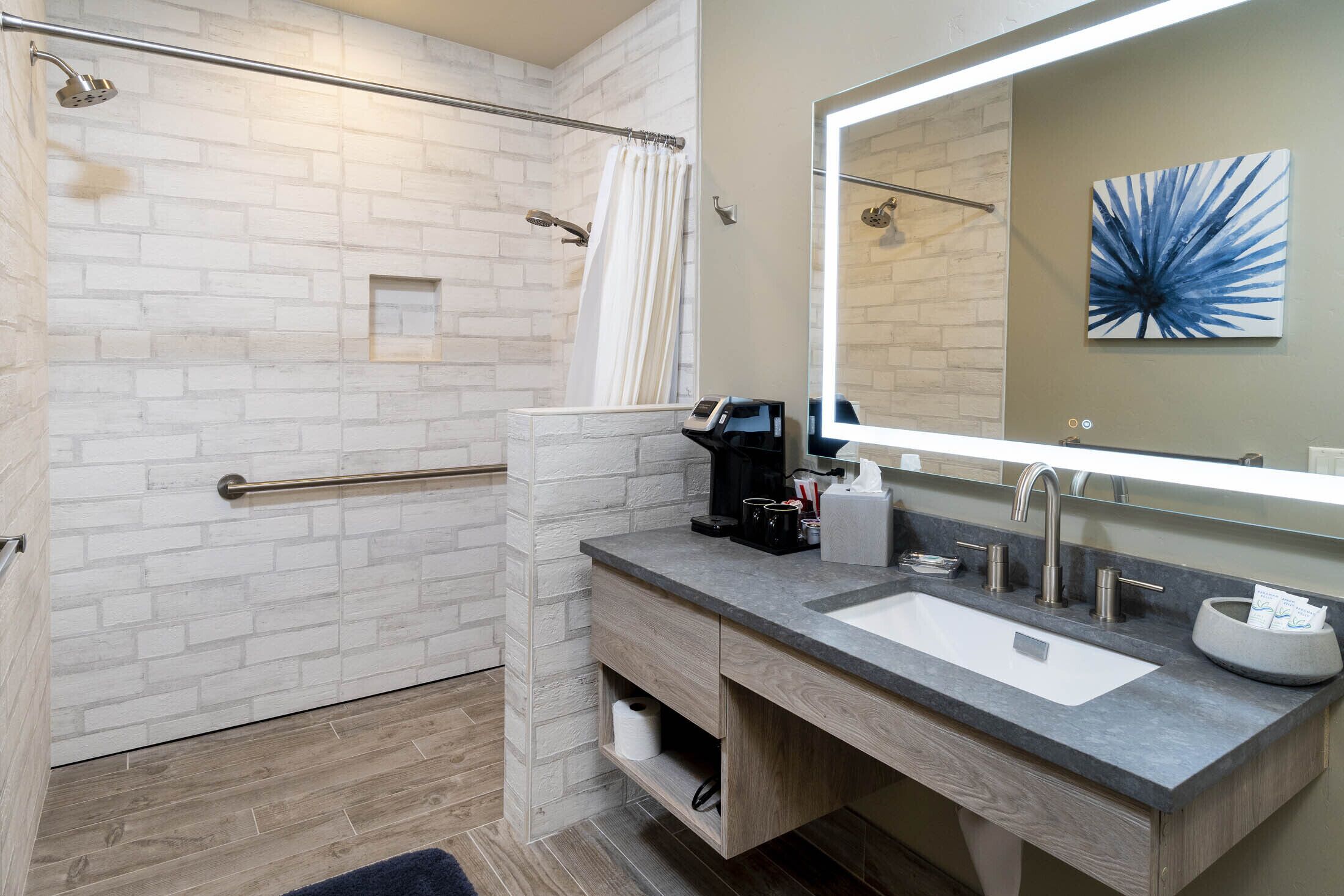 room | bathroom | hair dryer, towels, soap, shampoo