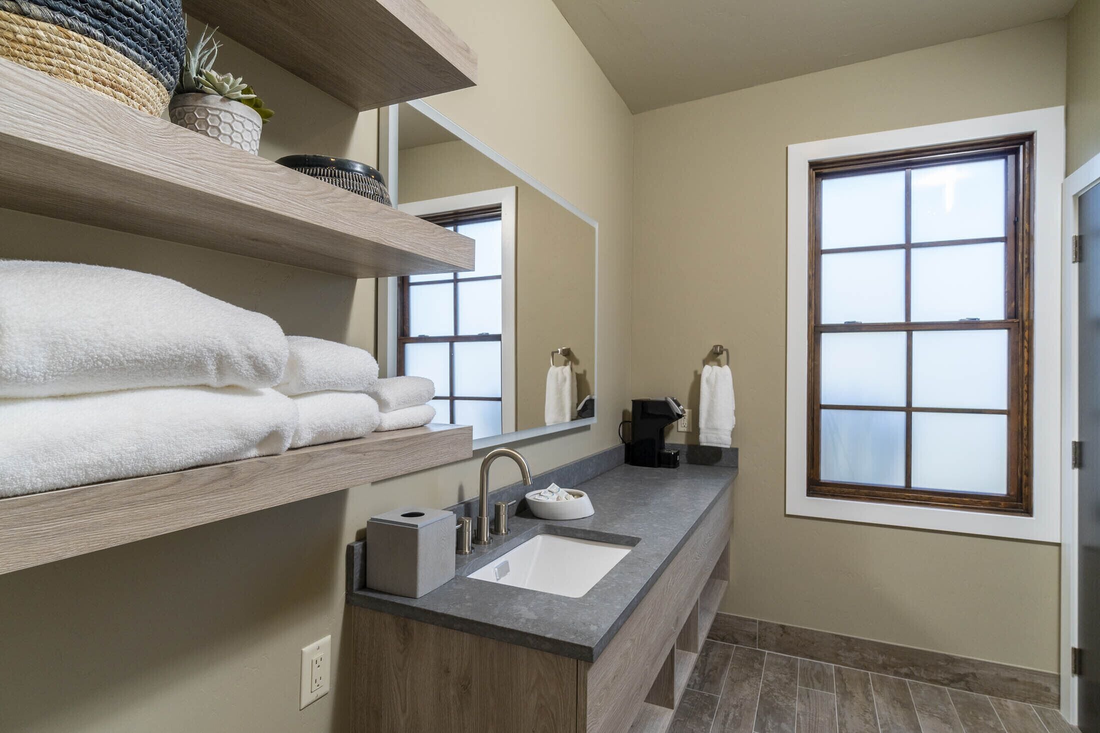 room | bathroom | hair dryer, towels, soap, shampoo