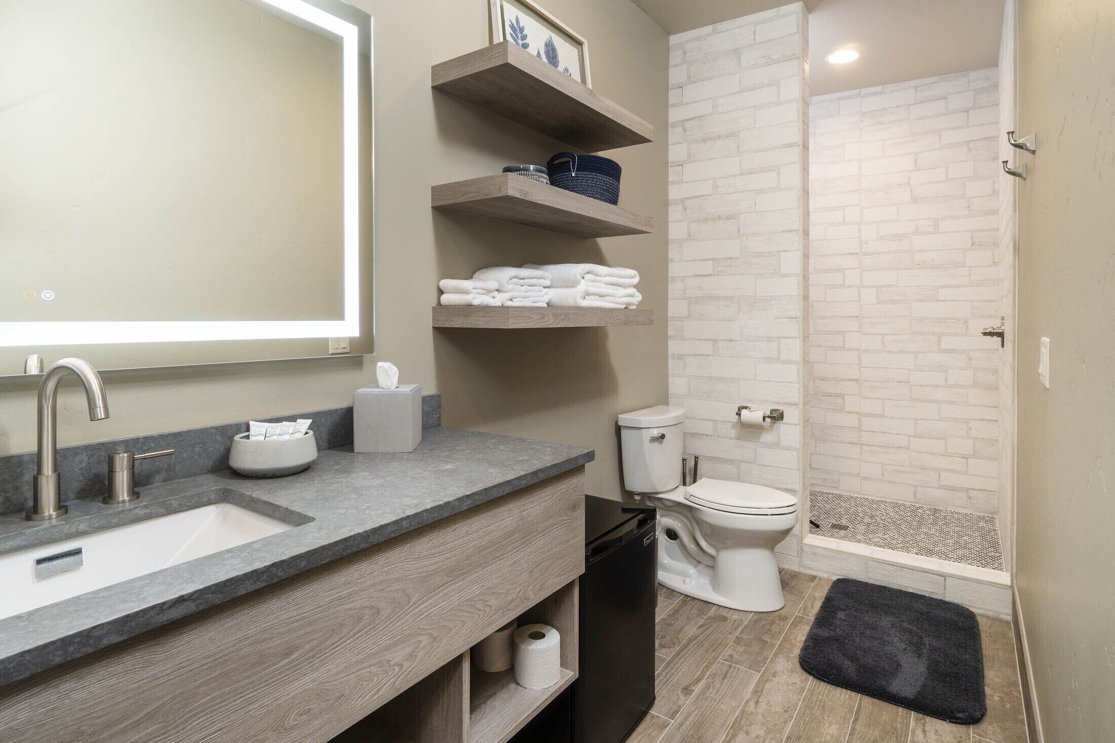 room | bathroom | hair dryer, towels, soap, shampoo