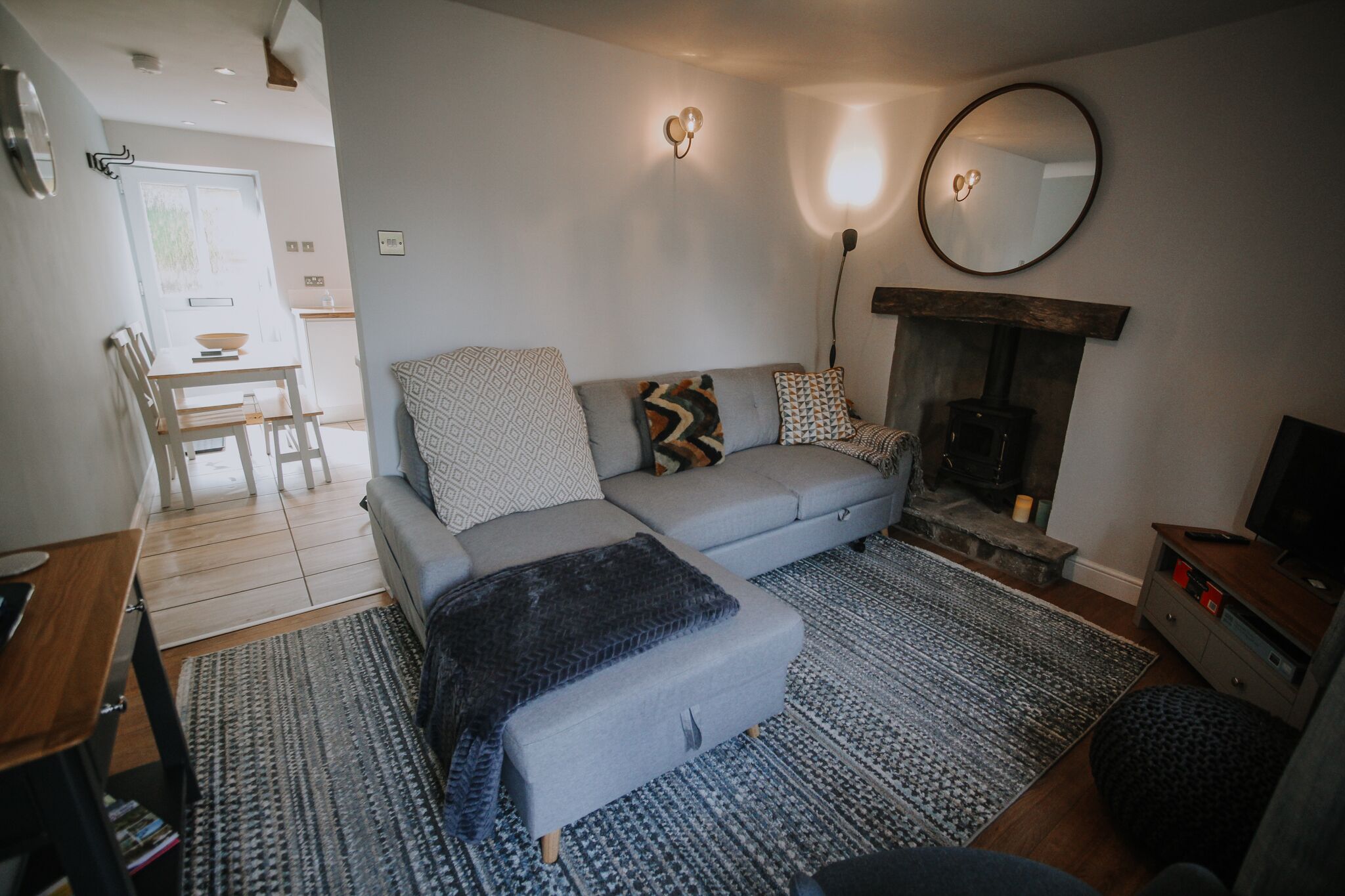 Smart TV, fireplace, books