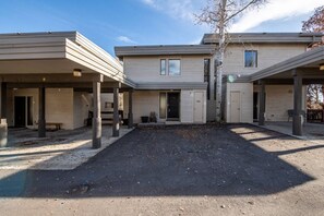 The simple, clean exterior and natural surroundings create a peaceful welcome.