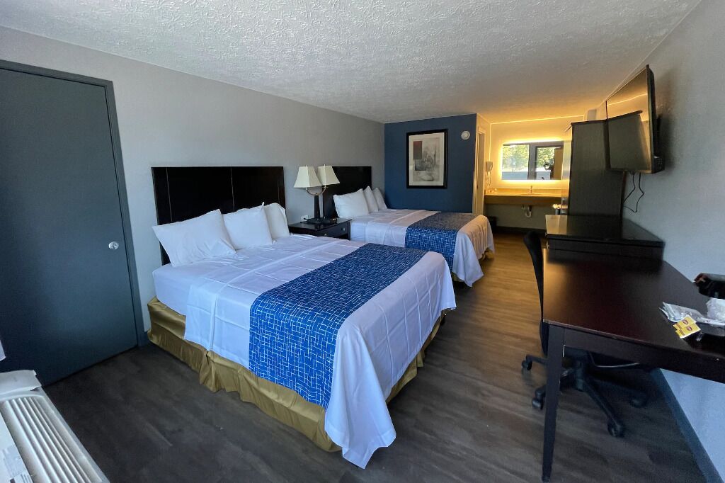 Premium bedding, pillowtop beds, blackout drapes, iron/ironing board