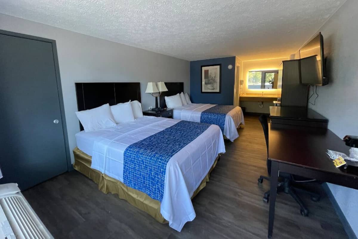 Premium bedding, pillowtop beds, blackout drapes, iron/ironing board