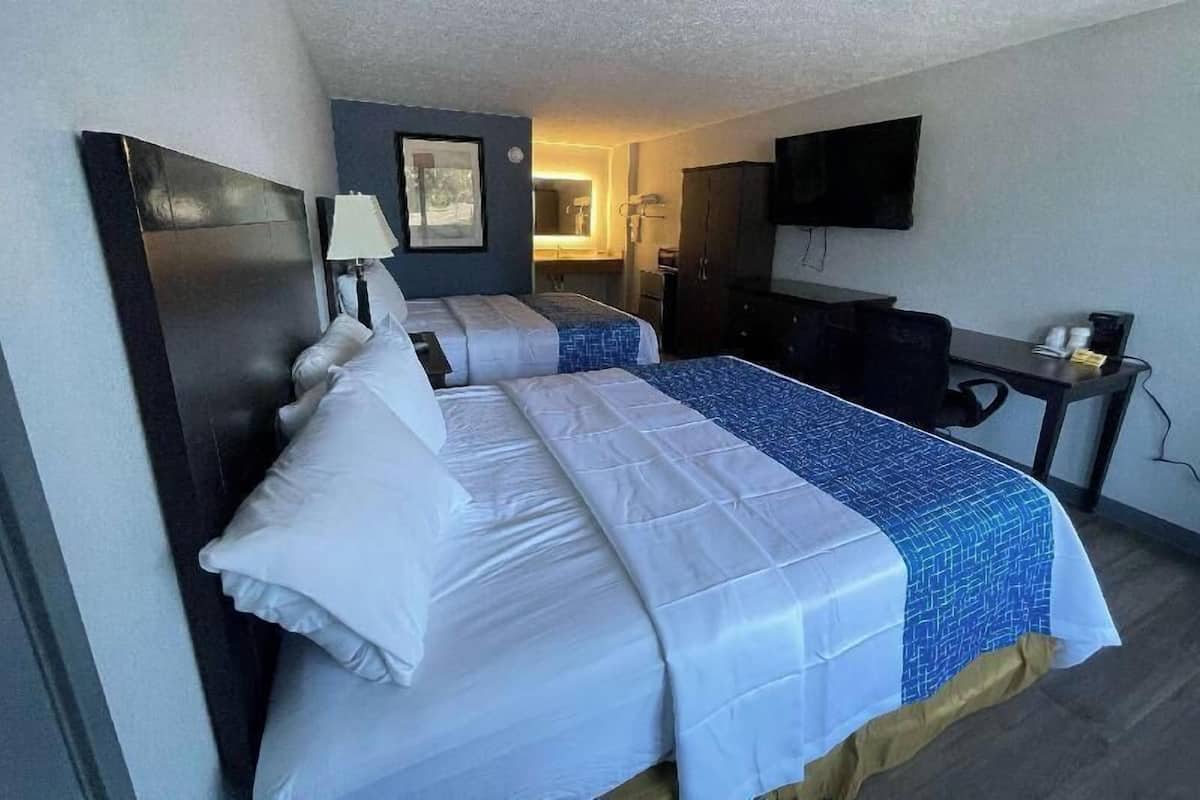 Premium bedding, pillowtop beds, blackout drapes, iron/ironing board