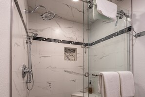 Bathtub, hair dryer, towels, soap