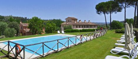 Seasonal outdoor pool, pool loungers