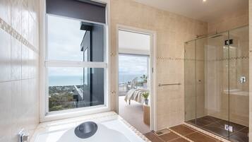 Bathtub, hair dryer, towels
