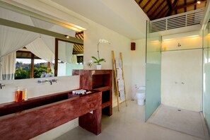 Bathtub, hair dryer, towels, soap