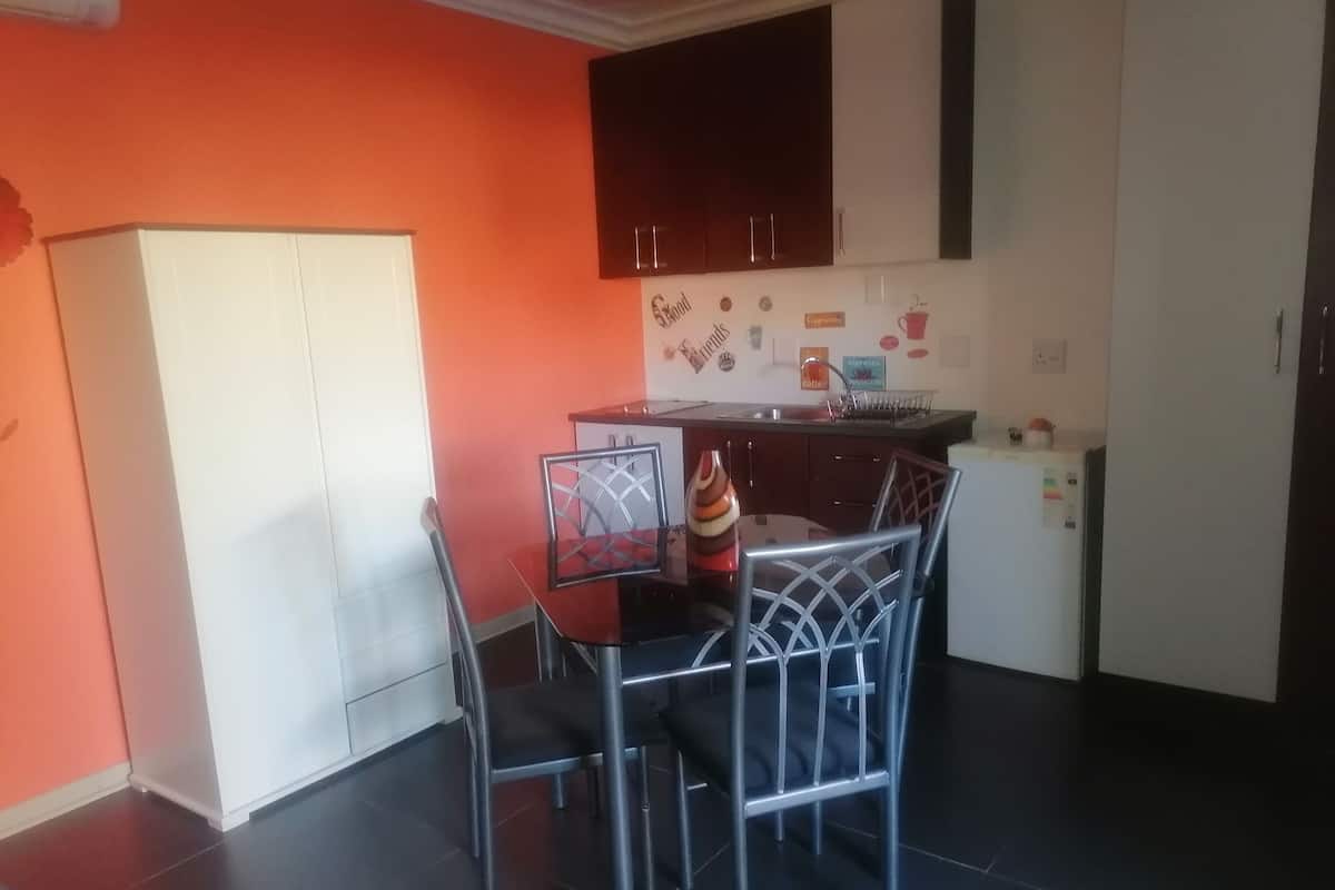 Luxury Room | Living area | 32-cm Smart TV with cable channels, streaming services