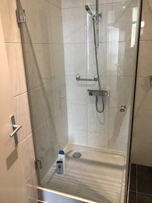 Shower, towels, soap, toilet paper