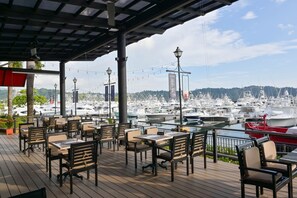 Enjoy al fresco dining with a view of the marina and surrounding landscape.