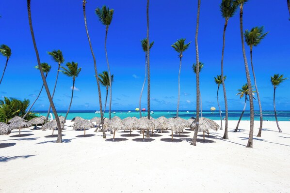 On the beach, sun-loungers, beach towels