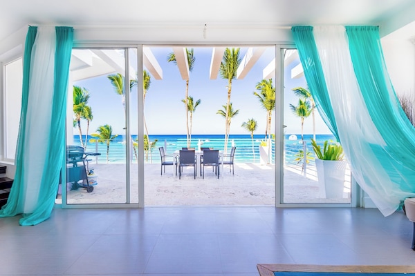 Your perfect 4-bedroom beachfront gateway!