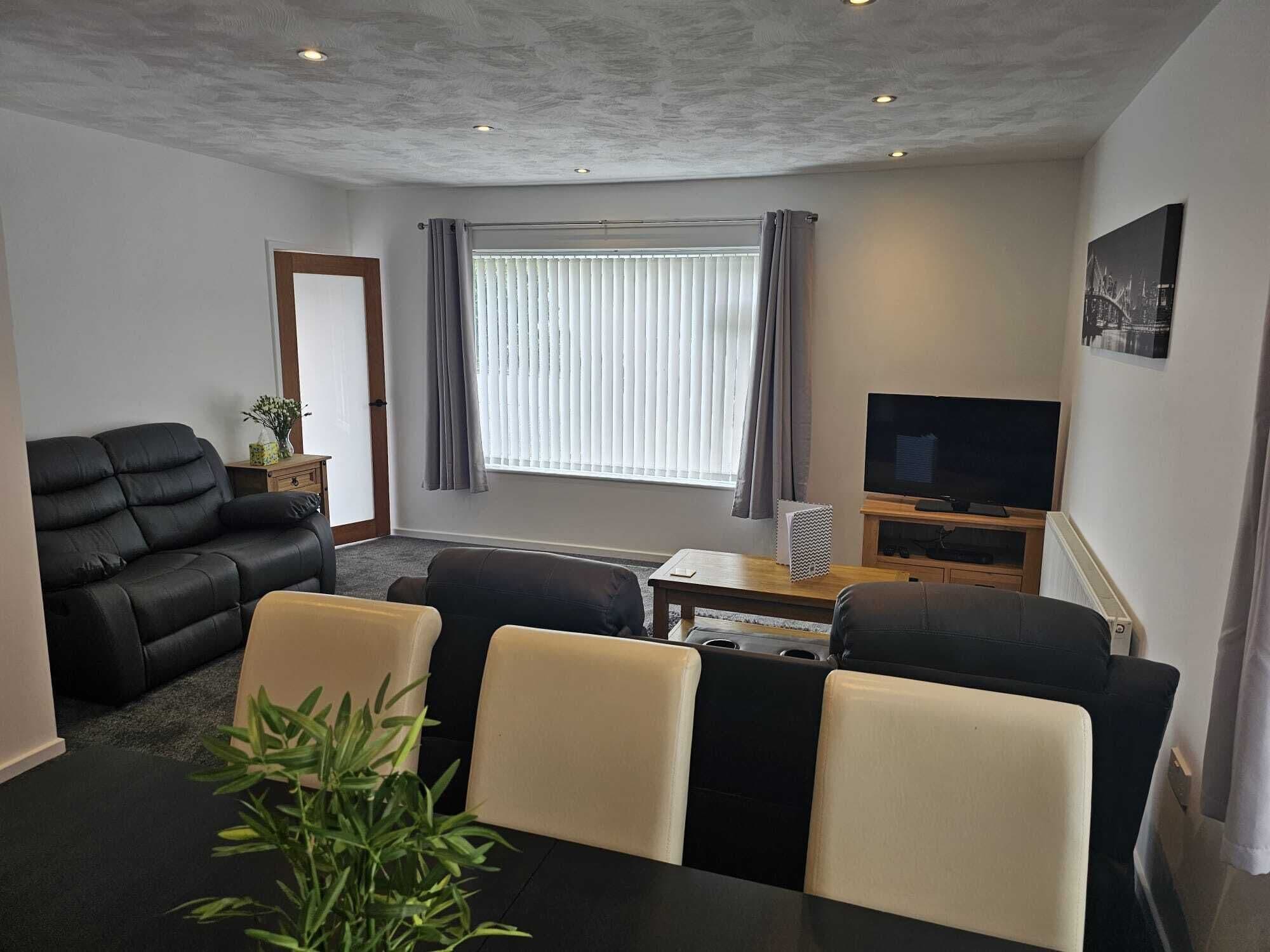 House | Living area | 30-inch TV with cable channels