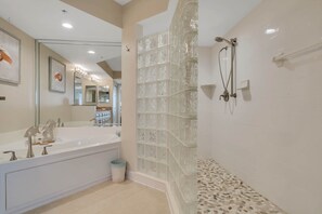 Combined shower/bathtub, hair dryer, towels, toilet paper - Oceanfront Penthouse ~ Professionally Designed (Daytona Beach Shore)