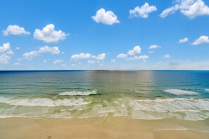 On the beach, sun-loungers, beach towels