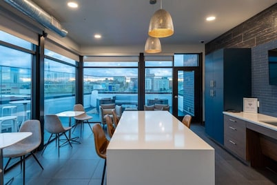 Modern 1BR Apt with Skywalk to Fiserv, Rooftop, and Parking