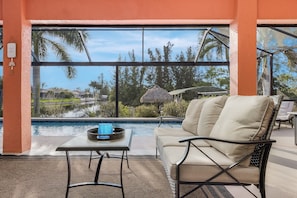 Outdoor pool, a heated pool - The perfect family vacation home with gulf access/heated pool/tiki bar/ kayaks! (Cape Coral)