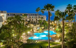 Calming pool and tropical landscaping at North Coast Village.