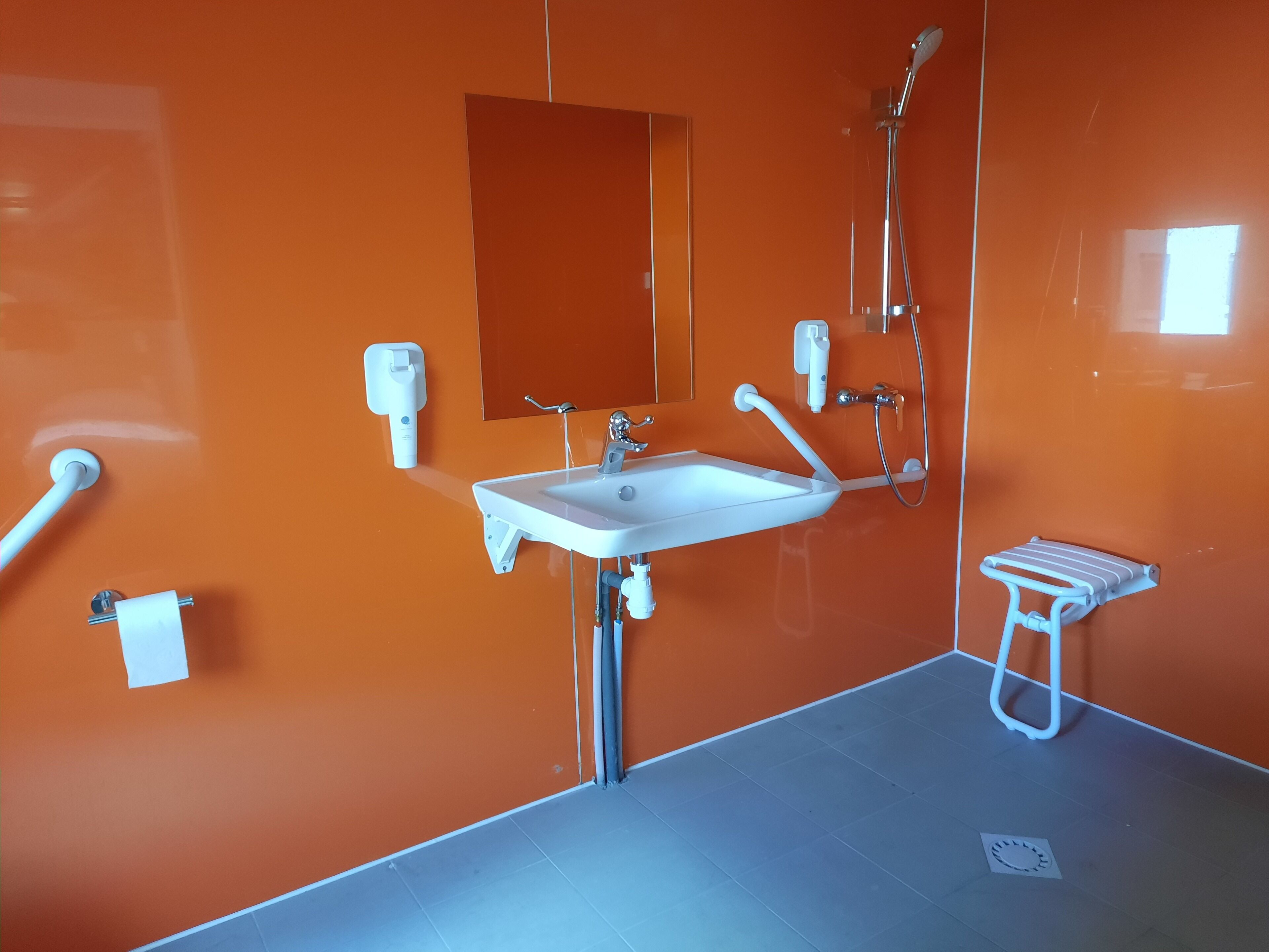 quadruple room, multiple beds | bathroom | eco-friendly toiletries, towels