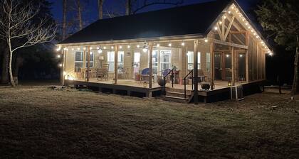 Lakeside Cabin on 228 Acres overlooking a private 5-acre lake. Events Add Fee
