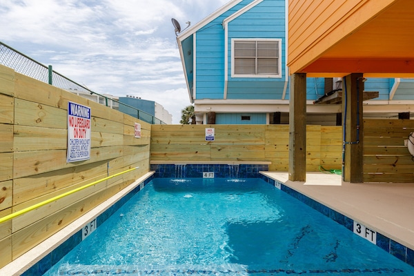 Come relax at the pool after a day at the beach.