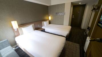 In-room safe, desk, laptop workspace, bed sheets