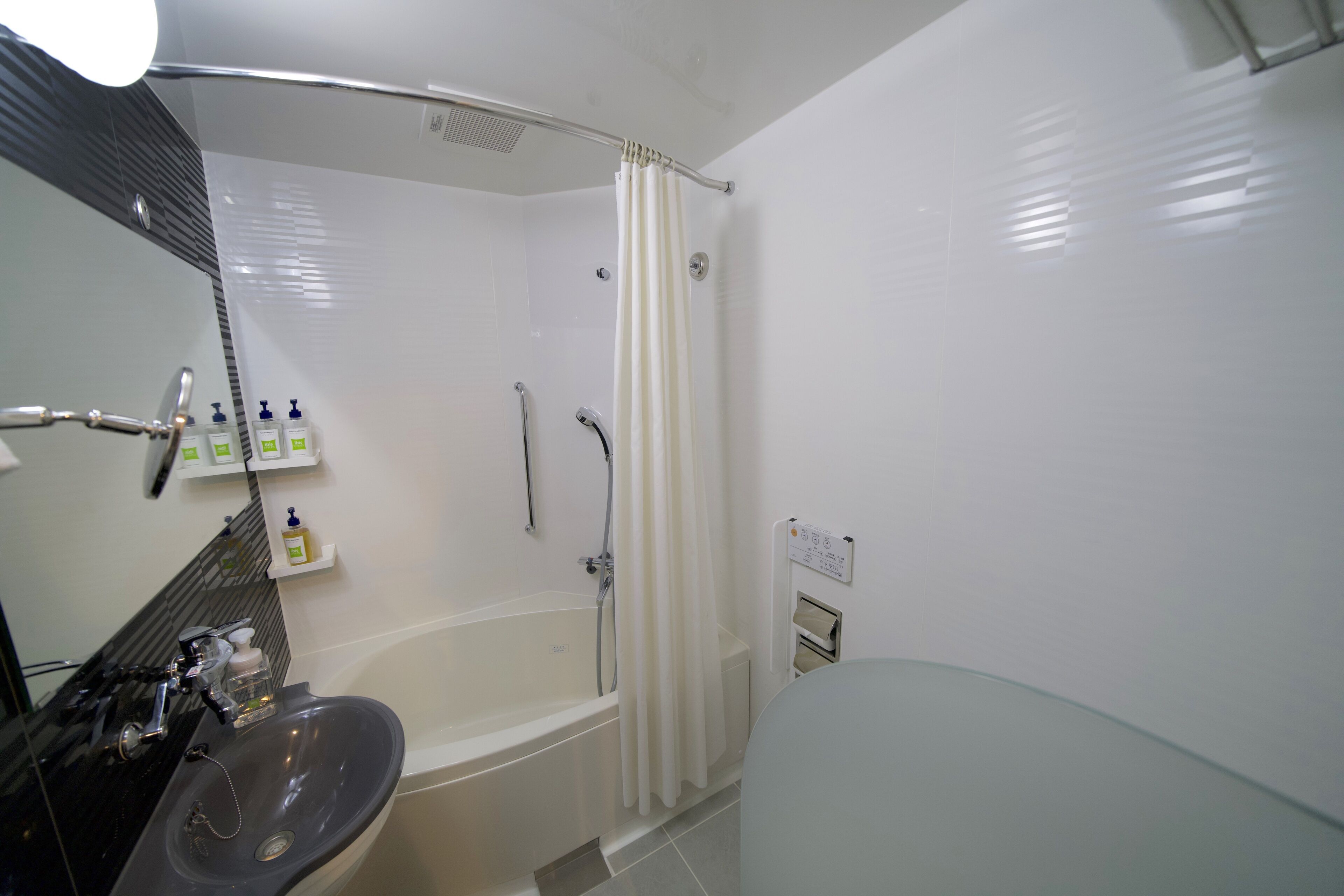 standard room, 2 single beds | bathroom | eco-friendly toiletries, hair dryer, slippers, towels