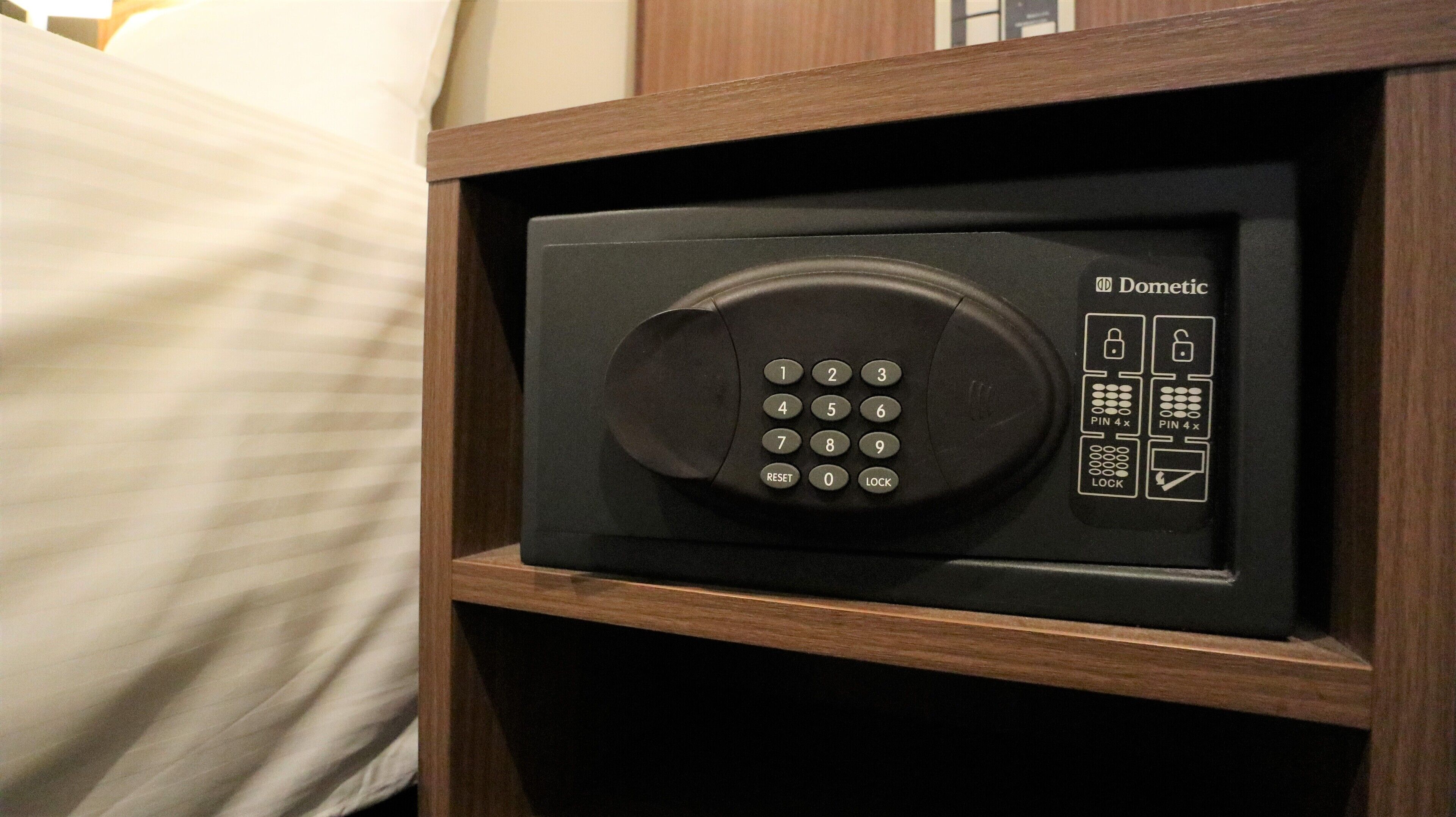 in-room safe, desk, laptop workspace, bed sheets