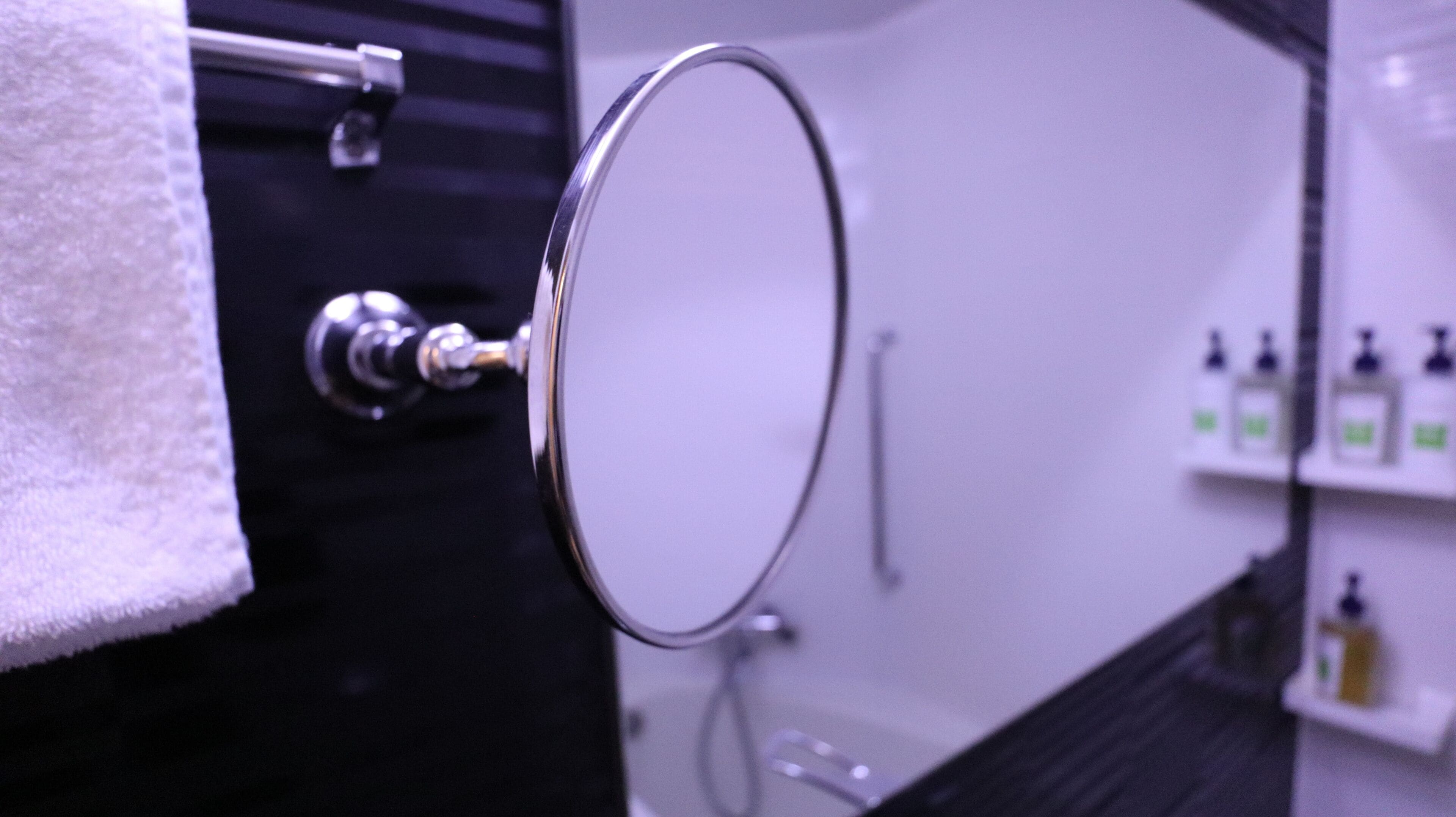 eco-friendly toiletries, hair dryer, slippers, towels