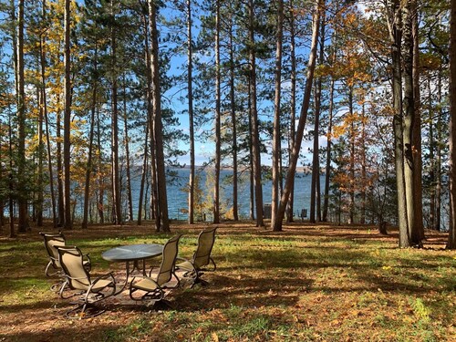 Cozy Hubbard Lake waterfront -beautiful views, private wooded lot, fireplace