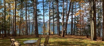 Cozy Hubbard Lake waterfront -beautiful views, private wooded lot, fireplace
