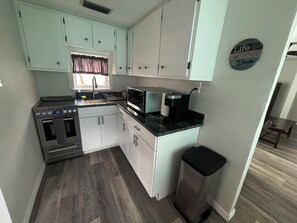 Fridge, microwave, oven, stovetop - Beach Ave Escape Unit A - just steps from the Beach! (Redington Shores)