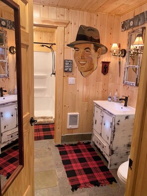 Shower, hair dryer, towels, toilet paper