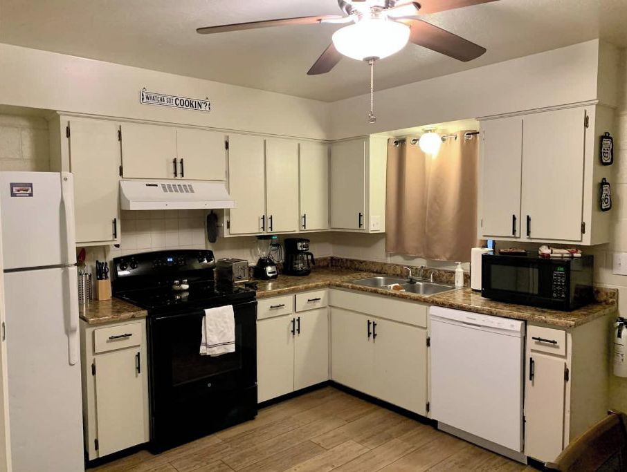 Coffee/tea maker, fridge, microwave, oven