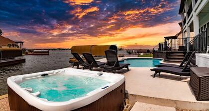 Waterfront villa w/ pool, hot tub, outdoor kitchen.