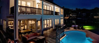 Waterfront villa w/ pool, hot tub, outdoor kitchen.