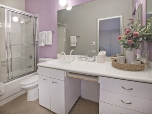 Bathtub, hair dryer, towels